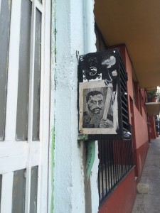 Emiliano Zapata wheat-pasted onto a box on the street 
