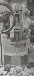 Removing unneeded aluminum from the cam cover with a Bridgeport Milling Machine 