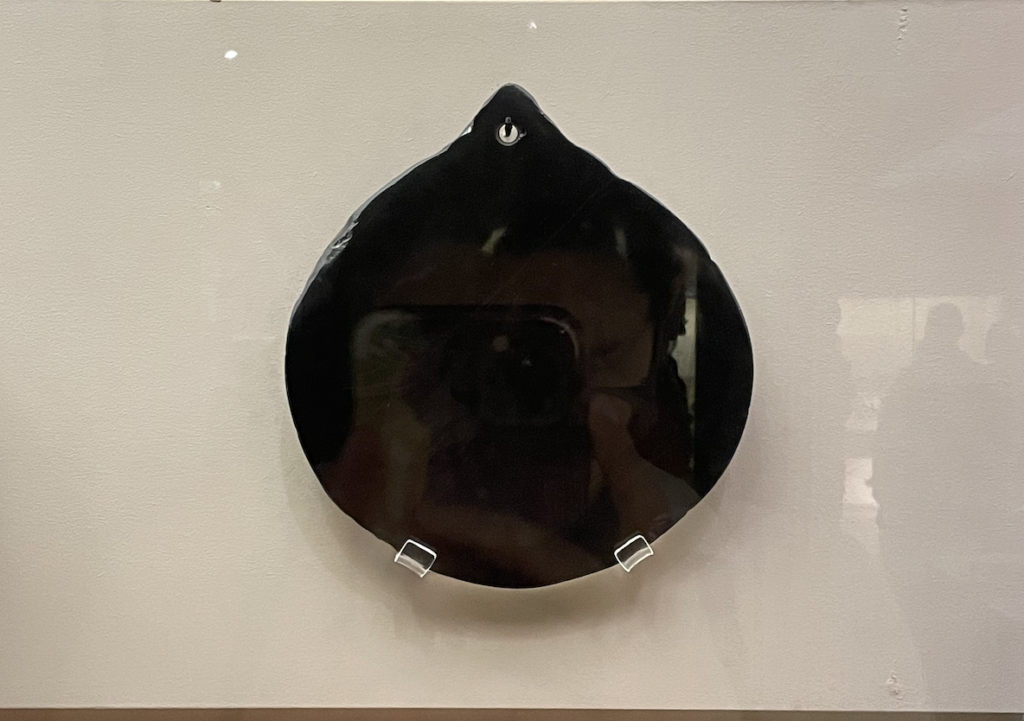 An additional obsidian mirror in a different section than John Dee's Magic Mirror, a mirror selfie in an obsidian mirror