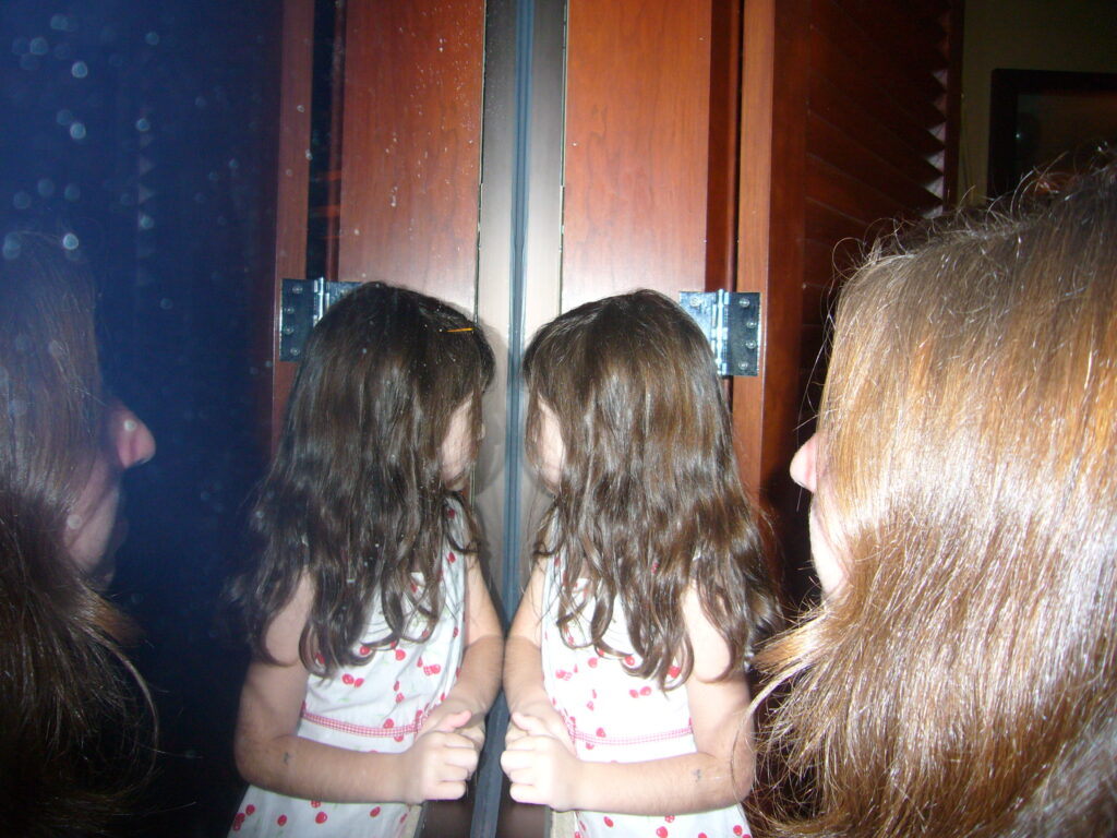 Child reflected in mirror
